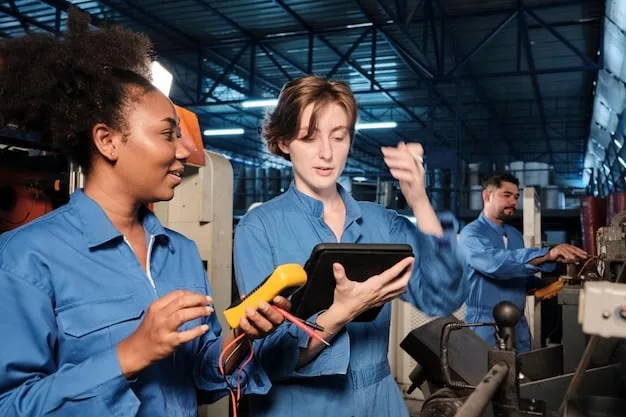 A group of factory workers collaborating on a maintenance task. The workers are using tablets to access data from the AI-powered predictive maintenance system.