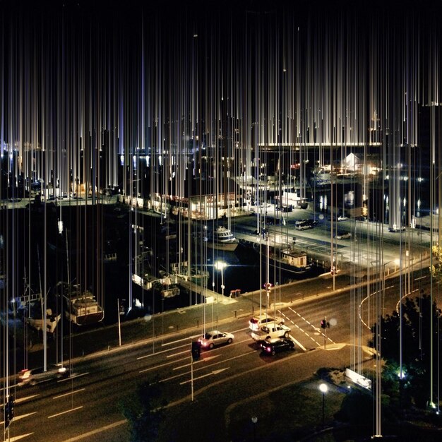 A futuristic cityscape at night with visible 5G wireless signals connecting buildings and vehicles, highlighting the role of wireless backhaul in enabling smart city infrastructure.